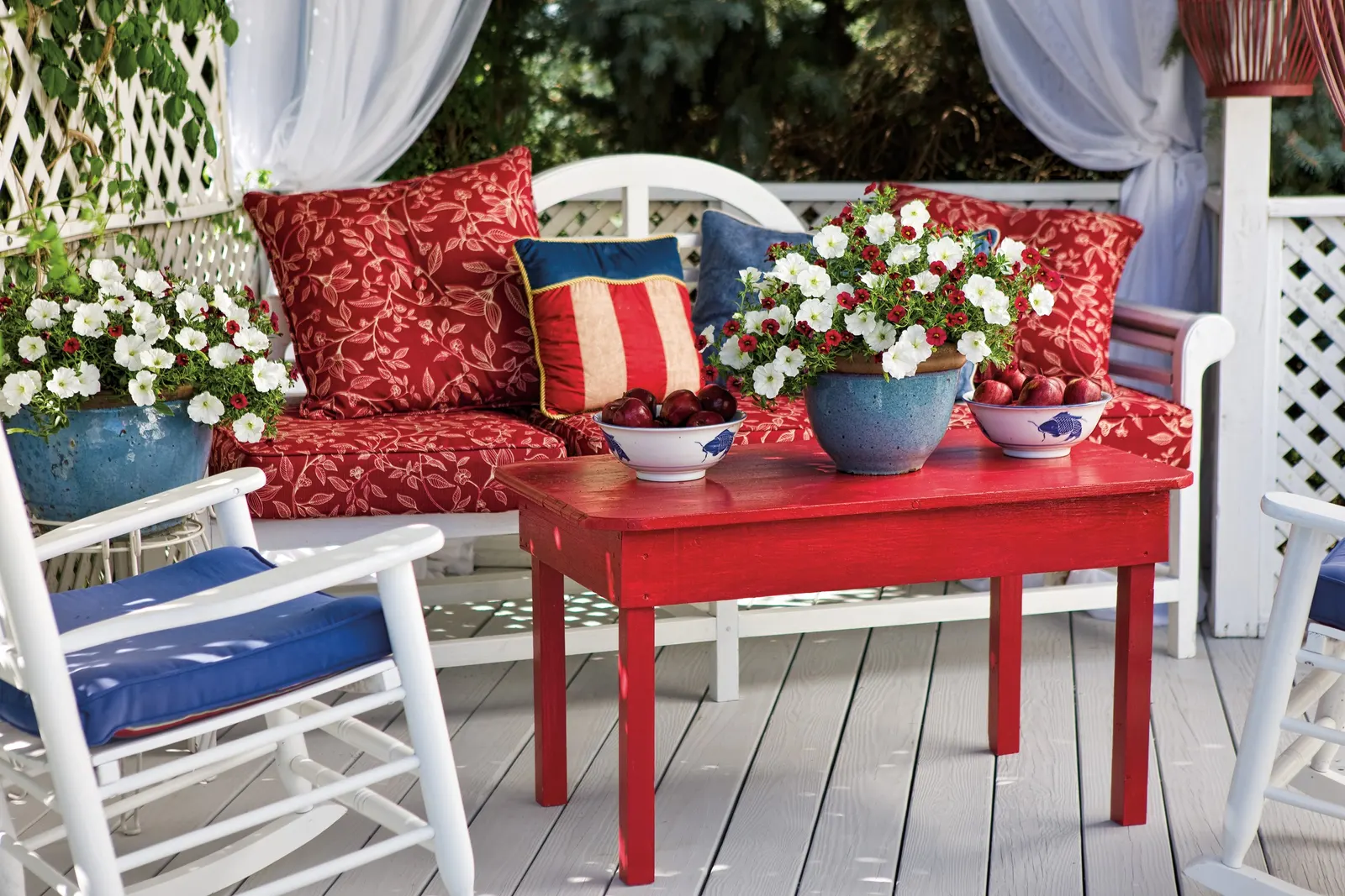 Red II Calibrachoa — Its bright red blooms also attract hummingbirds, adding movement and energy to sunny outdoor living spaces